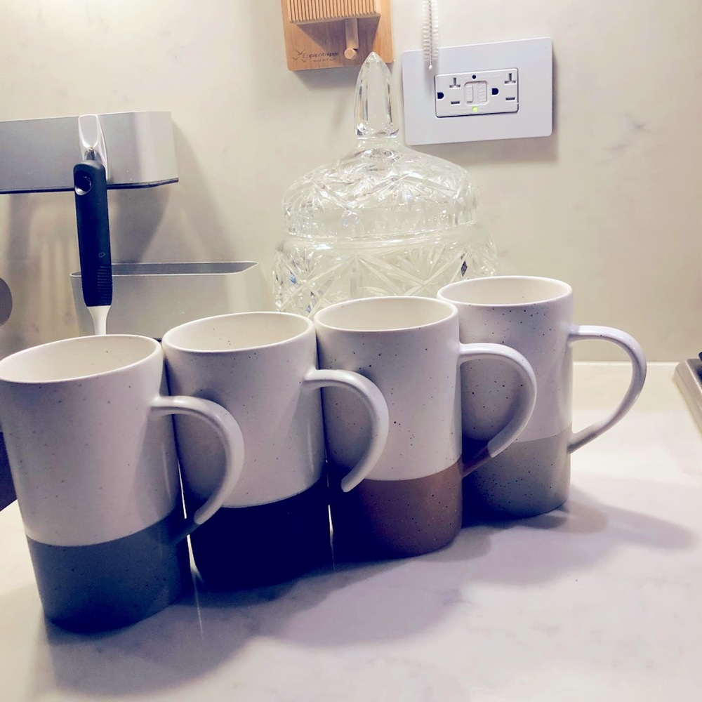 Mora ceramics-4 assorted coffee cups made out of ceramic.